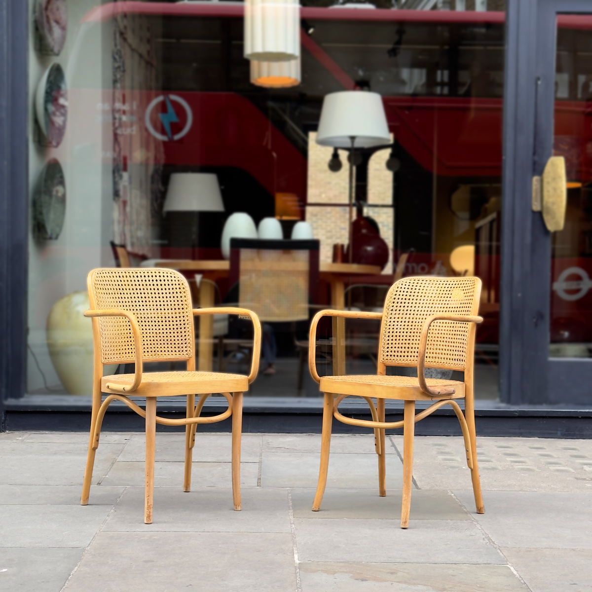 A pair of vintage Josef Hoffmann carver’s chairs, showcased at Sigmar London. These elegantly crafted chairs feature Hoffmann’s signature geometric design, with finely detailed woodwork and a timeless aesthetic reflecting early 20th-century Viennese craftsmanship.