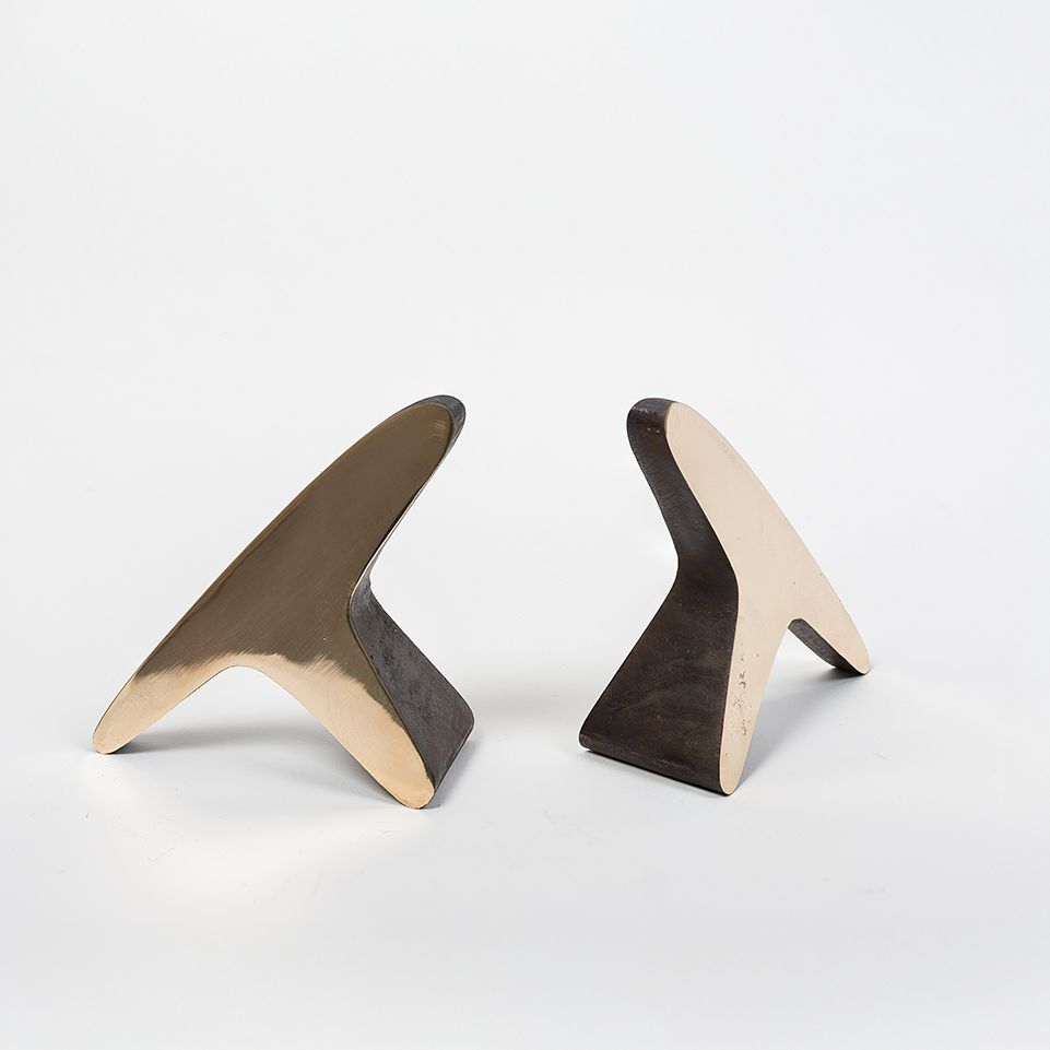 A pair of 'T' shaped bookends by Carl Auböck, crafted in the Werkstätte Auböck workshop, Austria, 1948. These bookends exemplify mid-century modern design and Austrian craftsmanship.