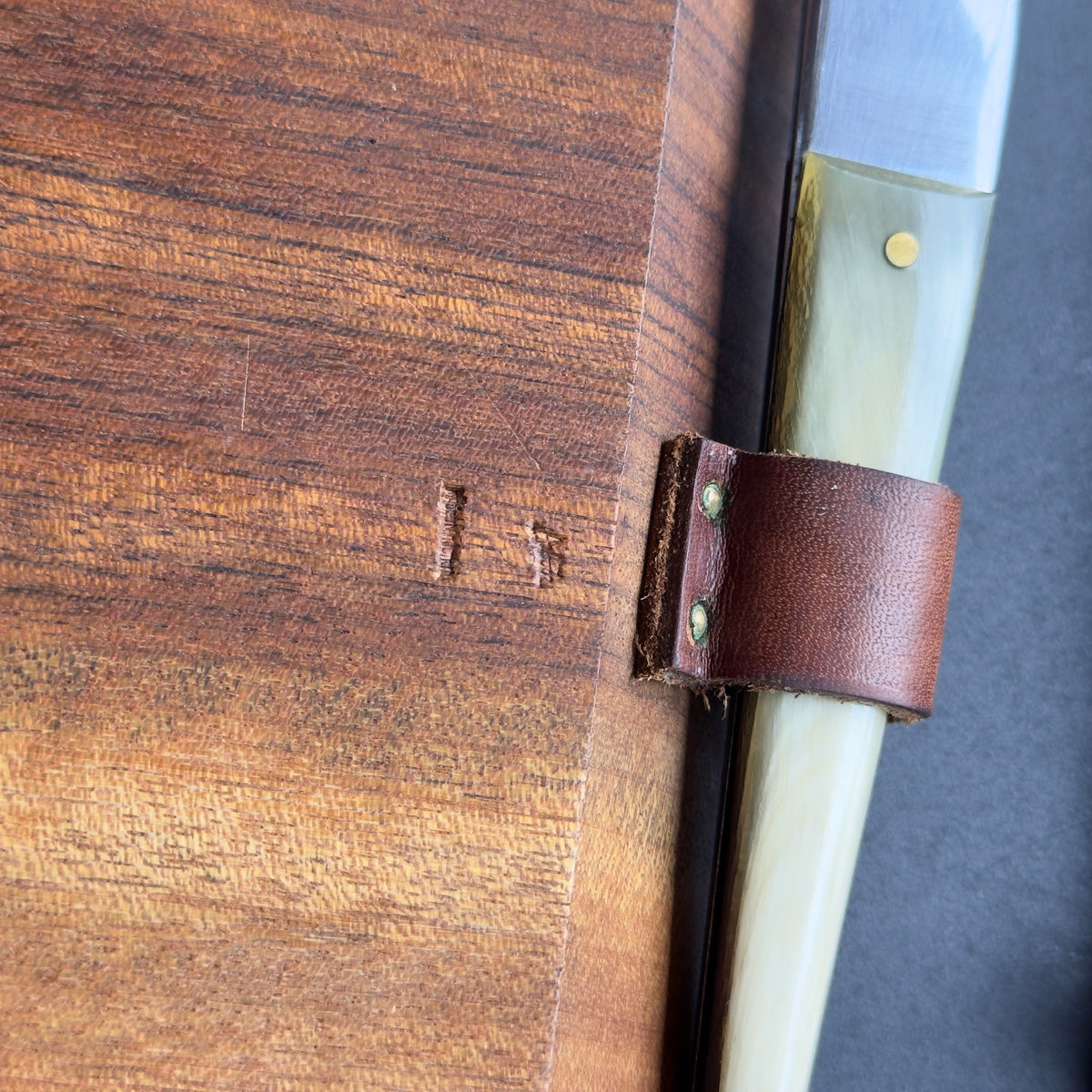 A pair of walnut picnic boards designed by Carl Aubock II during the 1950s. The combination of materials and neat construction are characteristic of the work produced by the prestigious Austrian workshop.