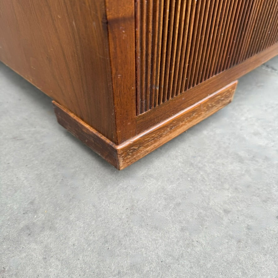 A large mahogany wardrobe designed in Denmark, retailed by Illums Bolighus, and attributed to Kaare Klint. This 1940s piece draws inspiration from Georgian design, showcasing exceptional Danish craftsmanship and timeless elegance.