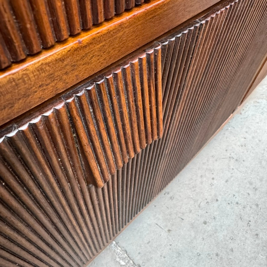 A large mahogany wardrobe designed in Denmark, retailed by Illums Bolighus, and attributed to Kaare Klint. This 1940s piece draws inspiration from Georgian design, showcasing exceptional Danish craftsmanship and timeless elegance.