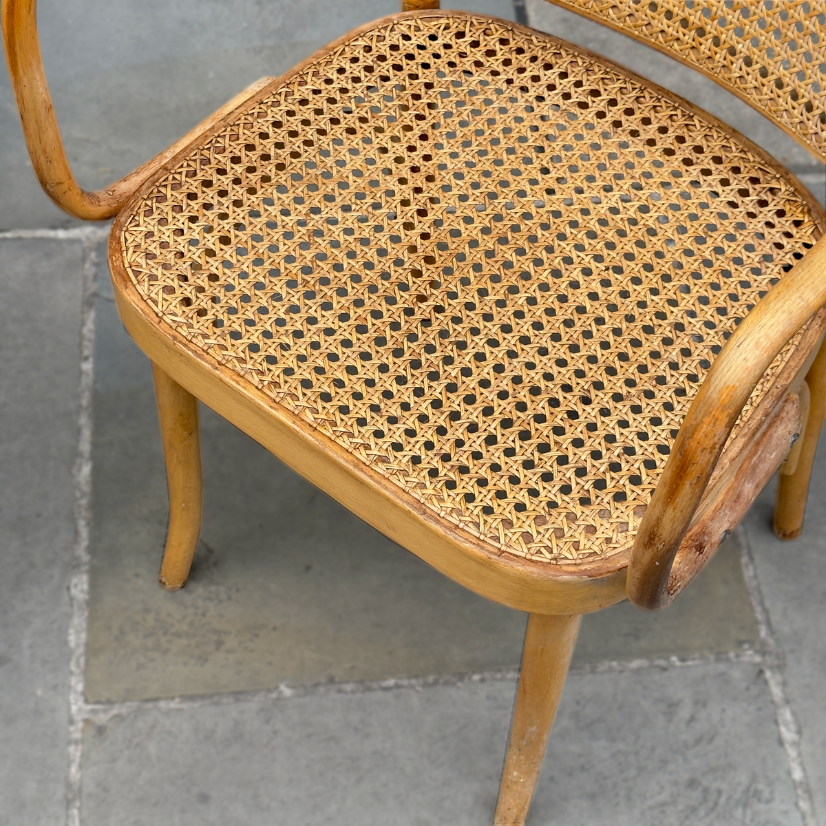 A pair of vintage Josef Hoffmann carver’s chairs, showcased at Sigmar London. These elegantly crafted chairs feature Hoffmann’s signature geometric design, with finely detailed woodwork and a timeless aesthetic reflecting early 20th-century Viennese craftsmanship."