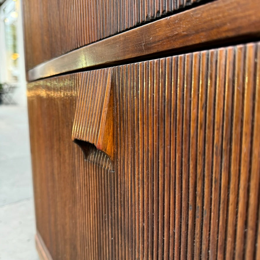 A large mahogany wardrobe designed in Denmark, retailed by Illums Bolighus, and attributed to Kaare Klint. This 1940s piece draws inspiration from Georgian design, showcasing exceptional Danish craftsmanship and timeless elegance.