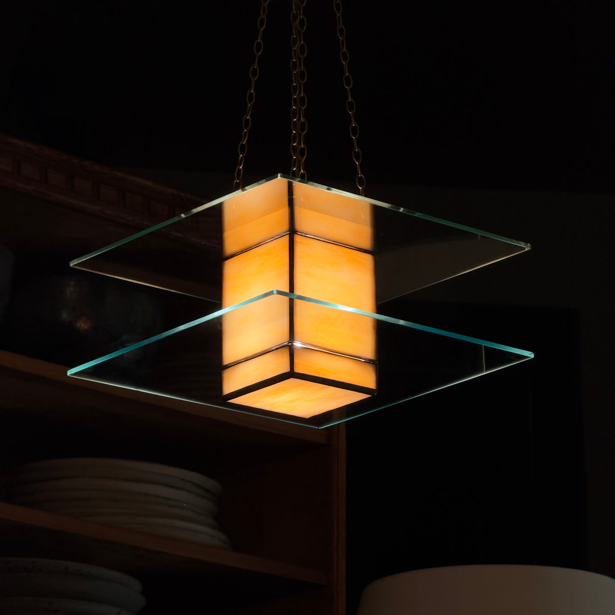 A 1930s Art Deco glass light pendant by Thomas Tait, inspired by the work of Robert Mallet-Stevens. This vintage piece reflects the emergence of Scottish modernism and refined Art Deco aesthetics.