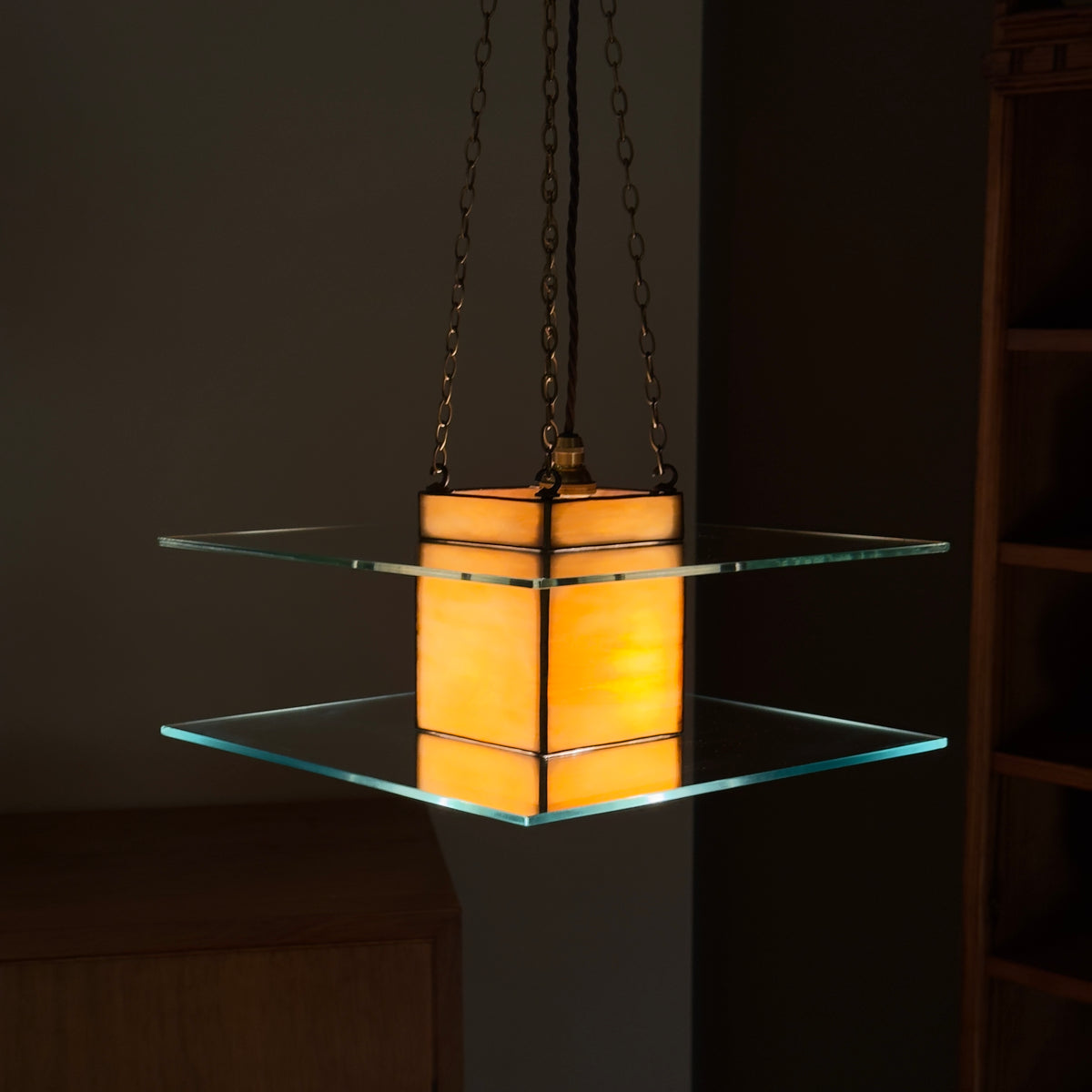 A 1930s Art Deco glass light pendant by Thomas Tait, inspired by the work of Robert Mallet-Stevens. This vintage piece reflects the emergence of Scottish modernism and refined Art Deco aesthetics.