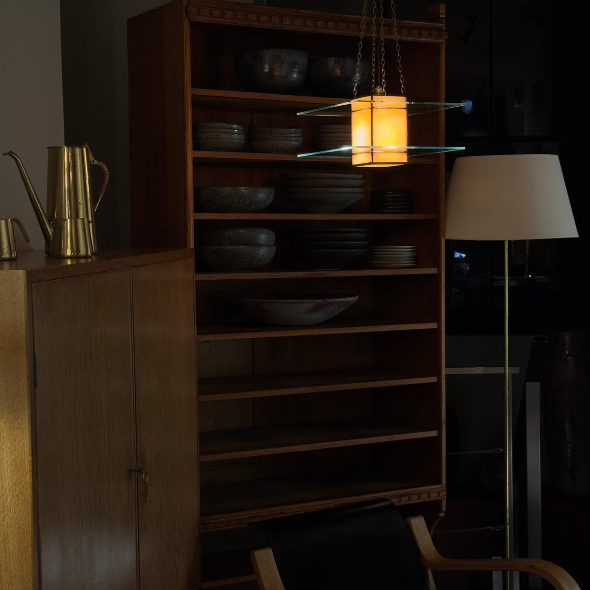 A 1930s Art Deco glass light pendant by Thomas Tait, inspired by the work of Robert Mallet-Stevens. This vintage piece reflects the emergence of Scottish modernism and refined Art Deco aesthetics.