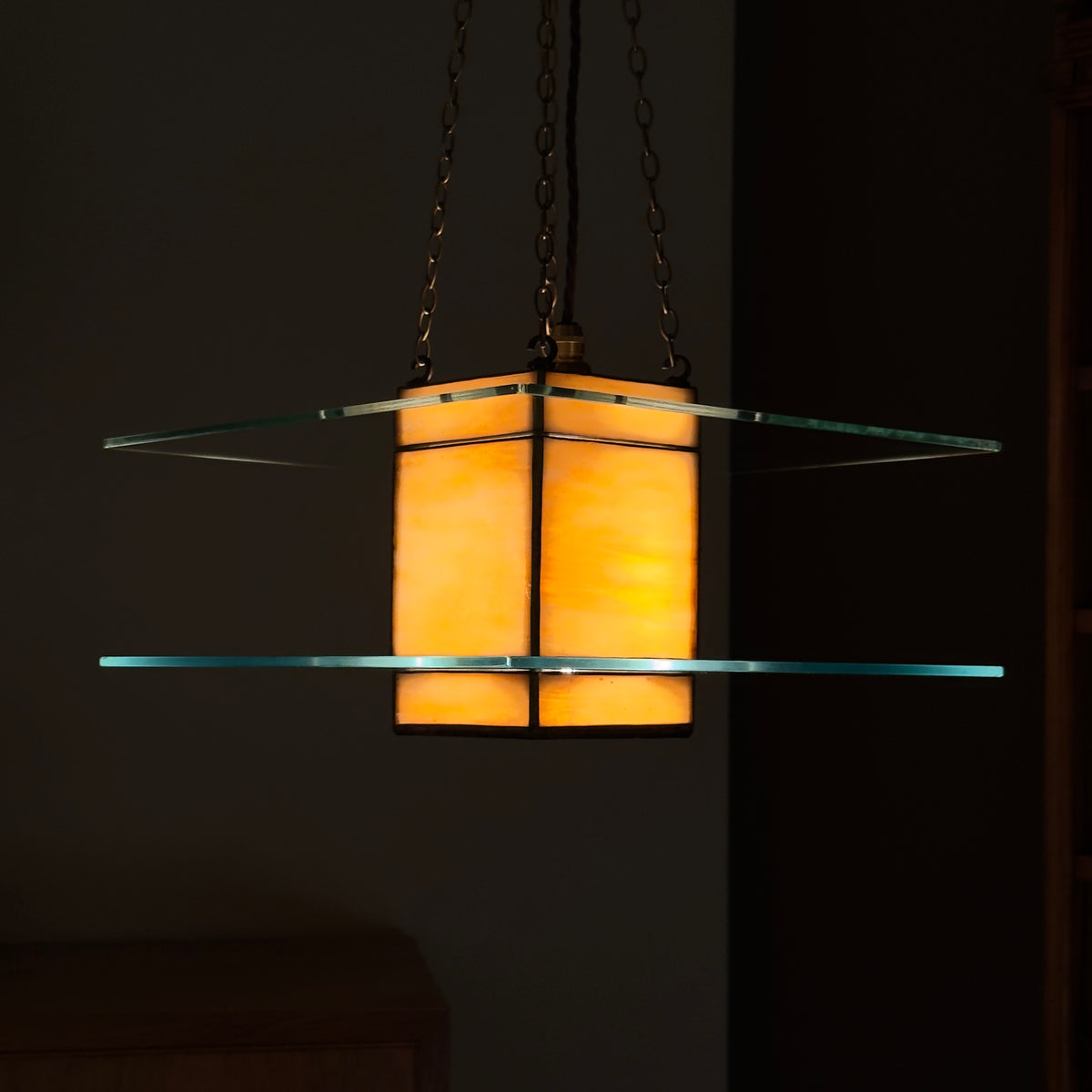 A 1930s Art Deco glass light pendant by Thomas Tait, inspired by the work of Robert Mallet-Stevens. This vintage piece reflects the emergence of Scottish modernism and refined Art Deco aesthetics.