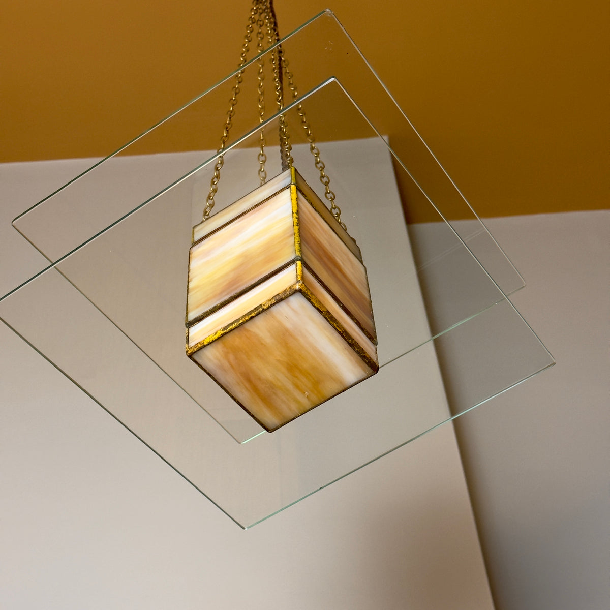 A 1930s Art Deco glass light pendant by Thomas Tait, inspired by the work of Robert Mallet-Stevens. This vintage piece reflects the emergence of Scottish modernism and refined Art Deco aesthetics.