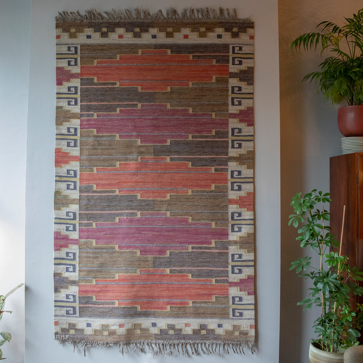 Bruna Heden (Brown Heath) Rolakan flatweave by Märta Måås-Fjetterström (MMF), Sweden. This geometric textile design showcases masterful Swedish craftsmanship, blending earthy tones with intricate woven patterns.