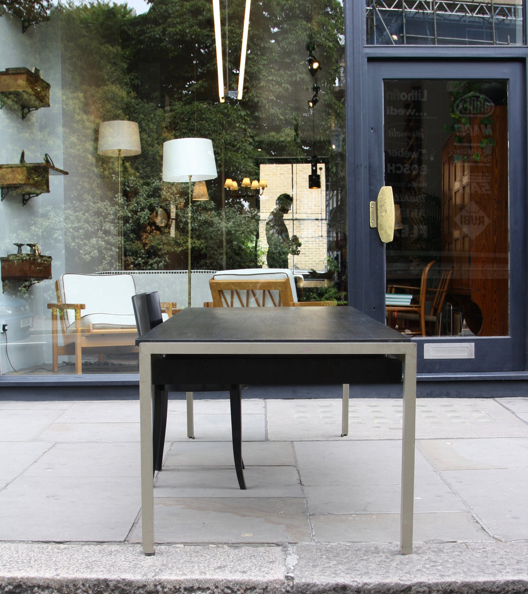 An original Professor Desk designed by Poul Kjærholm in 1955 for the Royal Danish Academy of Fine Arts in Copenhagen. This architectural piece exemplifies Kjærholm's minimalist design ethos and the refined craftsmanship of midcentury Danish modernism.