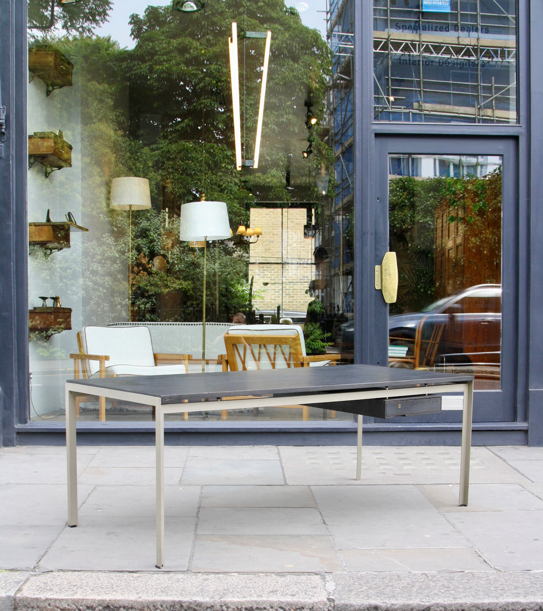 An original Professor Desk designed by Poul Kjærholm in 1955 for the Royal Danish Academy of Fine Arts in Copenhagen. This architectural piece exemplifies Kjærholm's minimalist design ethos and the refined craftsmanship of midcentury Danish modernism.