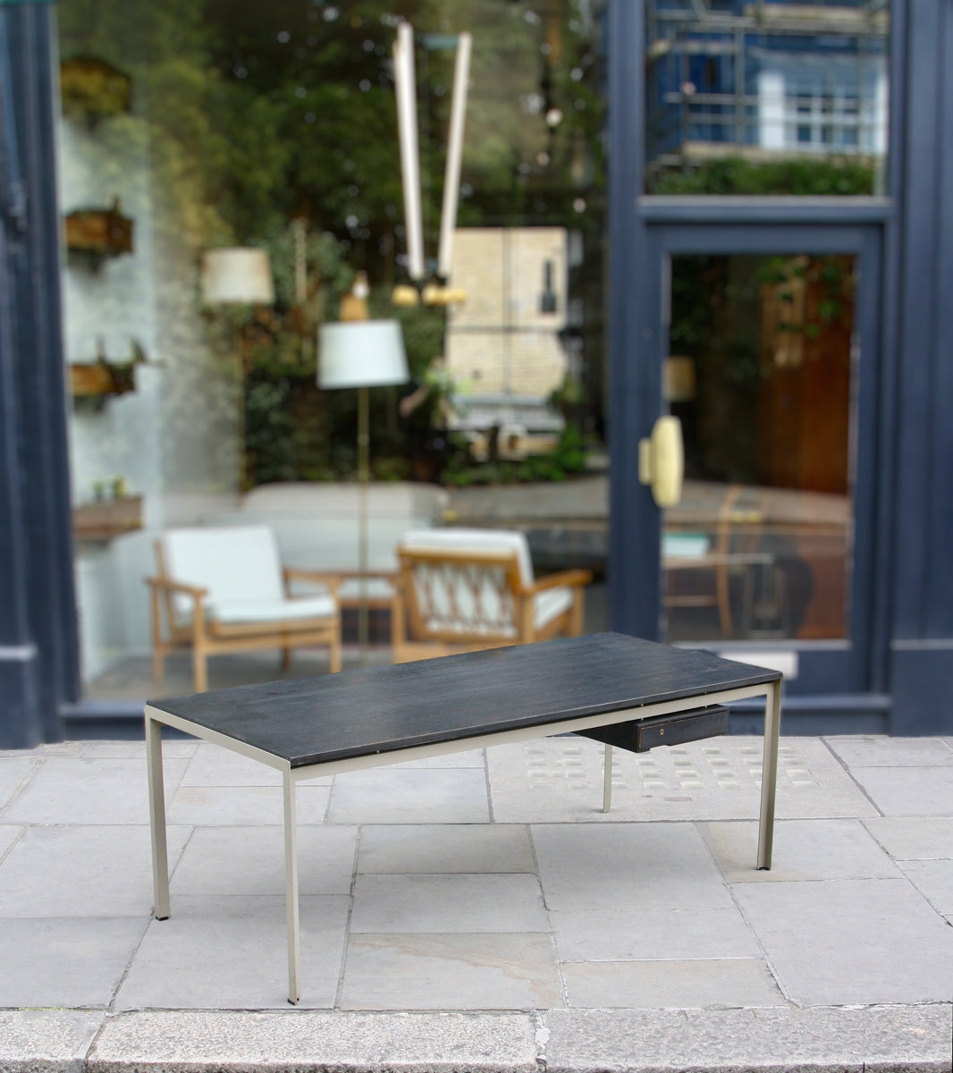 An original Professor Desk designed by Poul Kjærholm in 1955 for the Royal Danish Academy of Fine Arts in Copenhagen. This architectural piece exemplifies Kjærholm's minimalist design ethos and the refined craftsmanship of midcentury Danish modernism.