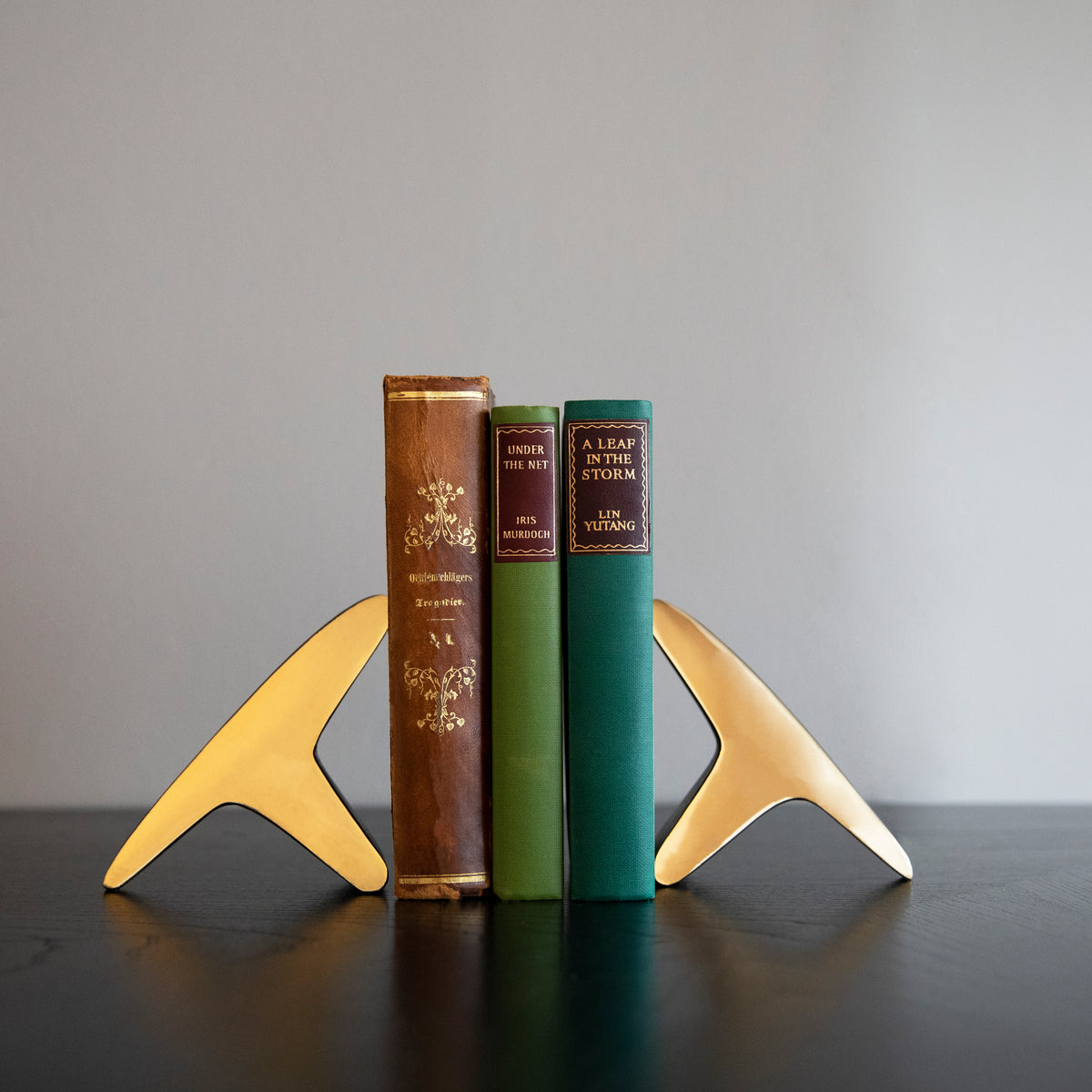 A pair of 'T' shaped bookends by Carl Auböck, crafted in the Werkstätte Auböck workshop, Austria, 1948. These bookends exemplify mid-century modern design and Austrian craftsmanship.