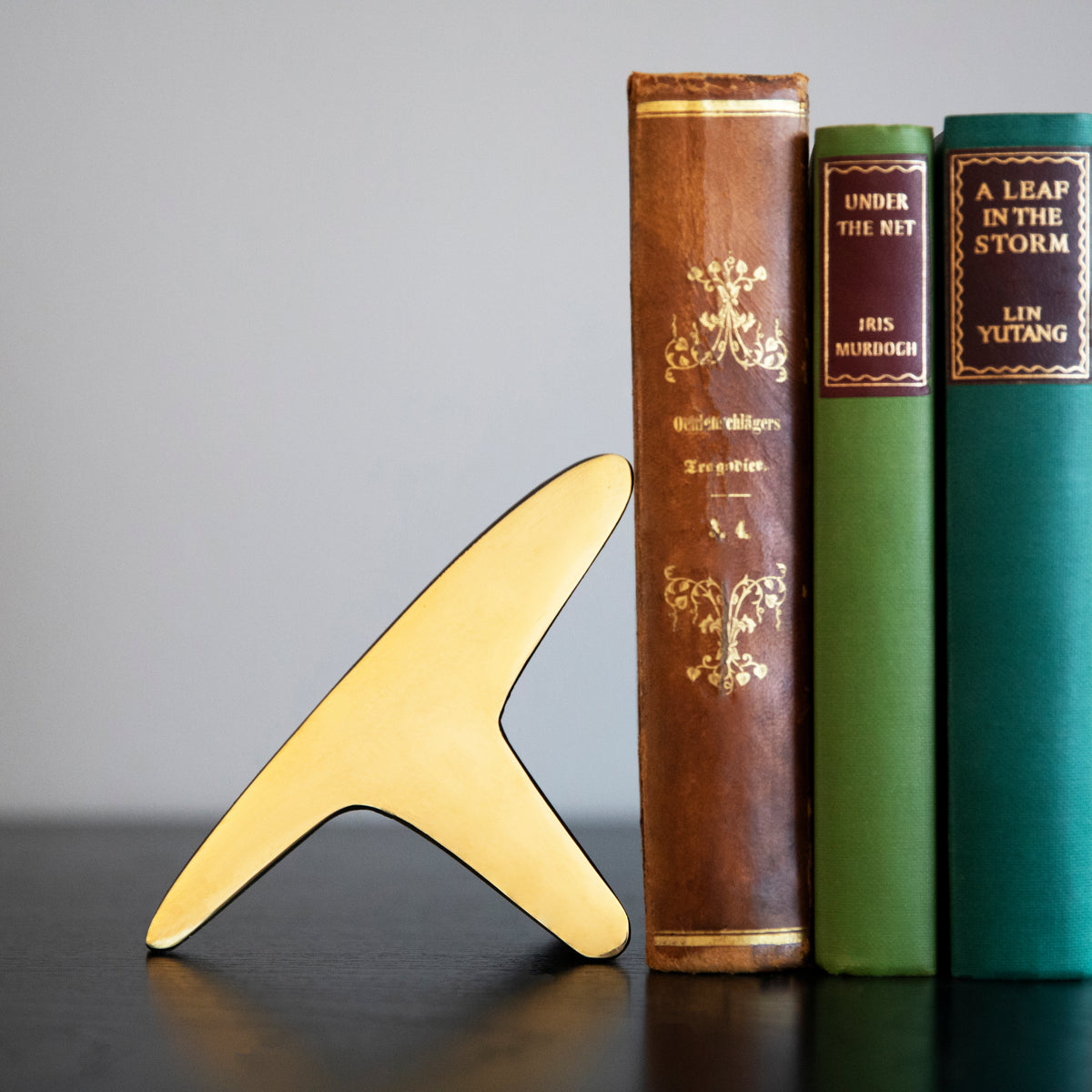 A pair of 'T' shaped bookends by Carl Auböck, crafted in the Werkstätte Auböck workshop, Austria, 1948. These bookends exemplify mid-century modern design and Austrian craftsmanship.