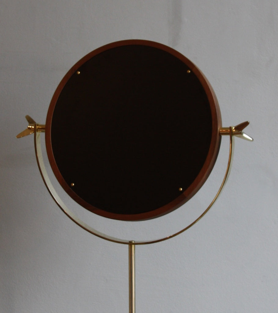 A floor mirror designed by Carl Auböck IV, made to order in the Auböck Werkstätte, Vienna, Austria. Originally conceived in the 1950s, this timeless piece exemplifies mid-century Austrian design and craftsmanship.