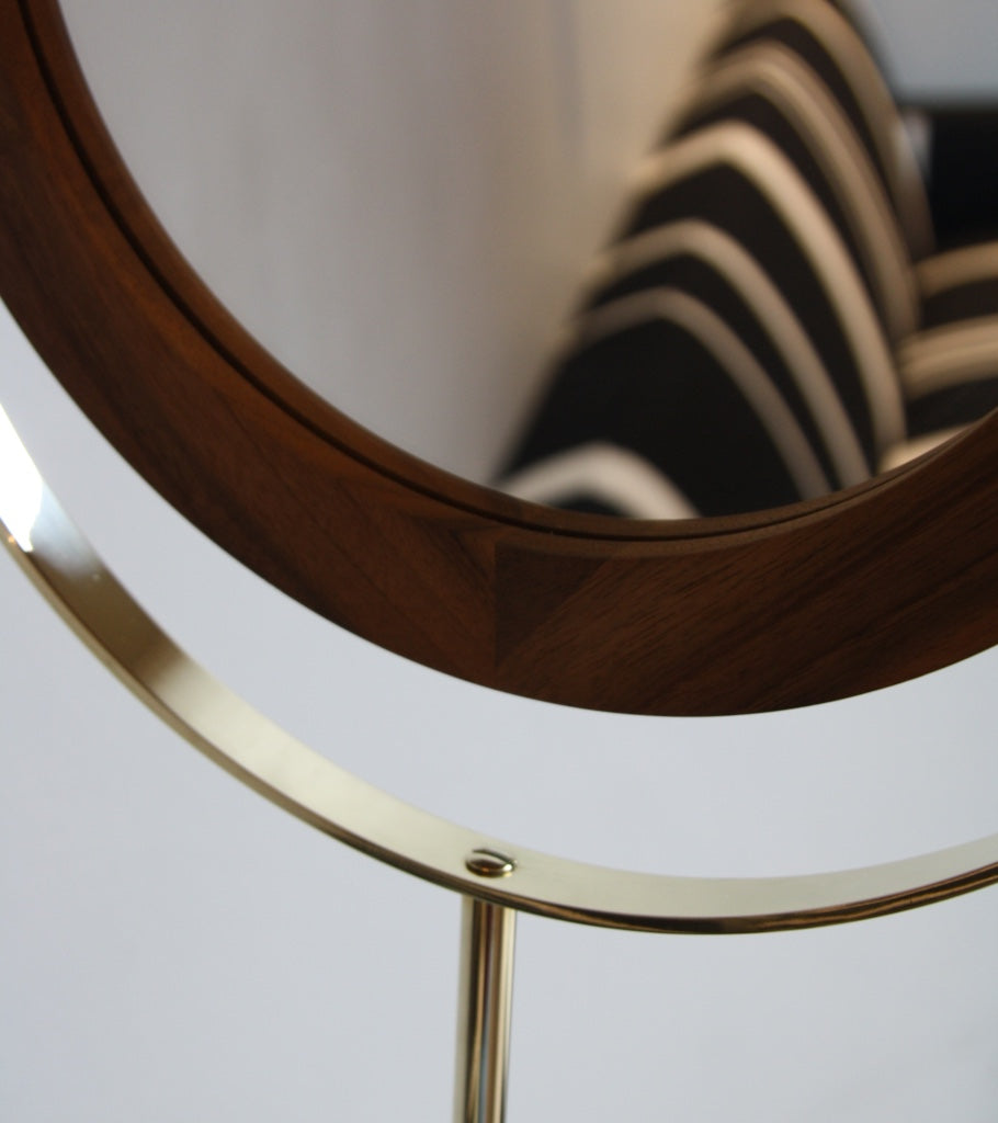 A floor mirror designed by Carl Auböck IV, made to order in the Auböck Werkstätte, Vienna, Austria. Originally conceived in the 1950s, this timeless piece exemplifies mid-century Austrian design and craftsmanship.