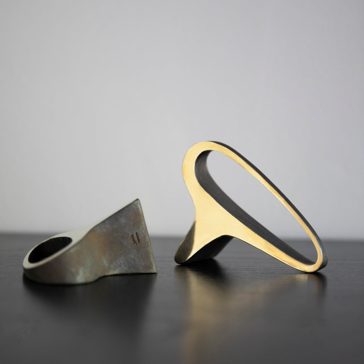 A brass earlobe-shaped bookend by Carl Auböck, crafted in the Werkstätte Auböck workshop and available at Sigmar London. This midcentury design piece exemplifies the innovative and artistic craftsmanship of Austrian modernism.