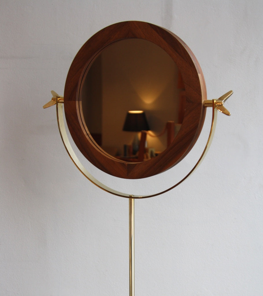 A floor mirror designed by Carl Auböck IV, made to order in the Auböck Werkstätte, Vienna, Austria. Originally conceived in the 1950s, this timeless piece exemplifies mid-century Austrian design and craftsmanship.