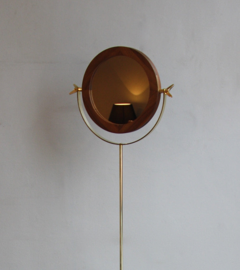 A floor mirror designed by Carl Auböck IV, made to order in the Auböck Werkstätte, Vienna, Austria. Originally conceived in the 1950s, this timeless piece exemplifies mid-century Austrian design and craftsmanship.