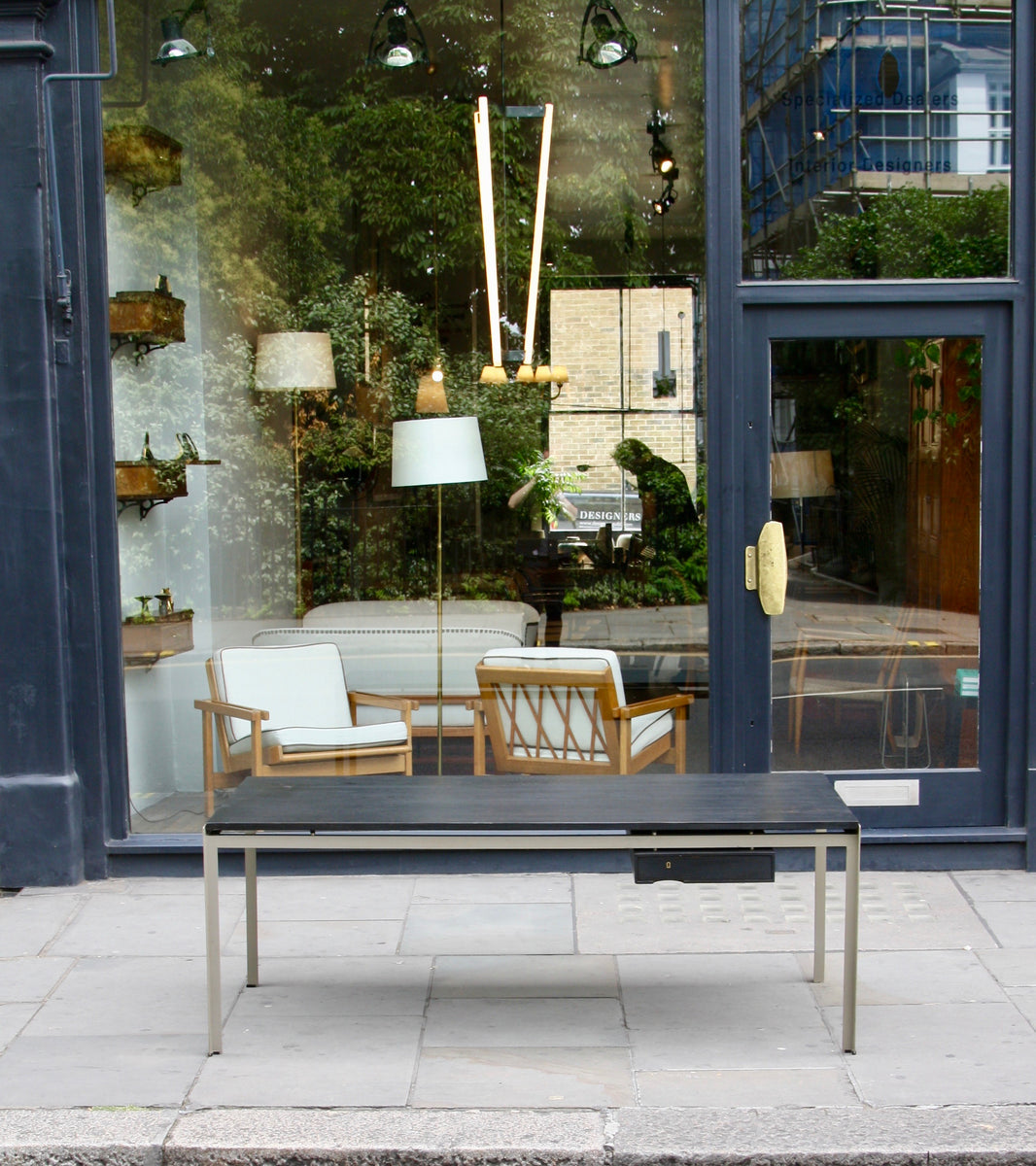 An original Professor Desk designed by Poul Kjærholm in 1955 for the Royal Danish Academy of Fine Arts in Copenhagen. This architectural piece exemplifies Kjærholm's minimalist design ethos and the refined craftsmanship of midcentury Danish modernism.