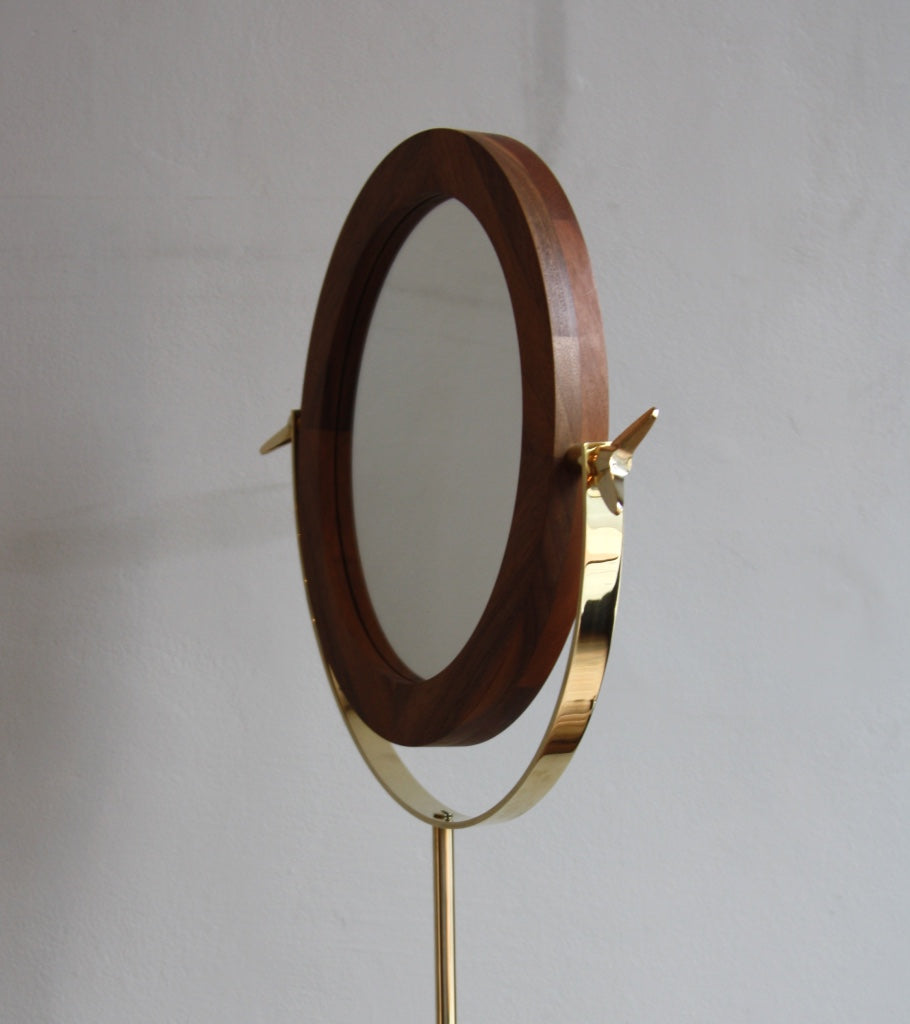 A floor mirror designed by Carl Auböck IV, made to order in the Auböck Werkstätte, Vienna, Austria. Originally conceived in the 1950s, this timeless piece exemplifies mid-century Austrian design and craftsmanship.