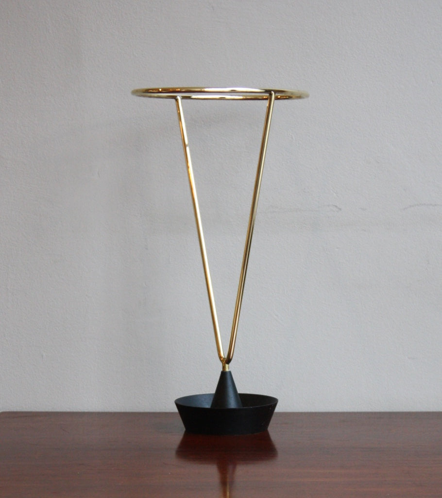 An umbrella stand designed by Carl Auböck, crafted in the Werkstätte Auböck workshop in Austria, 1955. This piece highlights mid-century Austrian craftsmanship and functional modernist design.